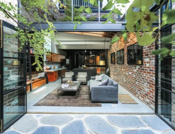 A Garage Was Converted Into This Industrial Living Room